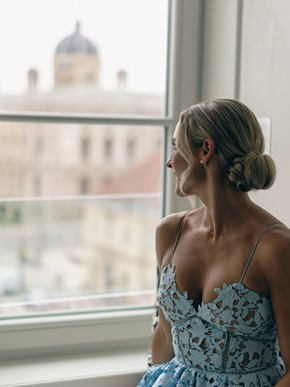 Guest at Hotel Sans Souci Vienna enjoying the view over the rooftops of Vienna.